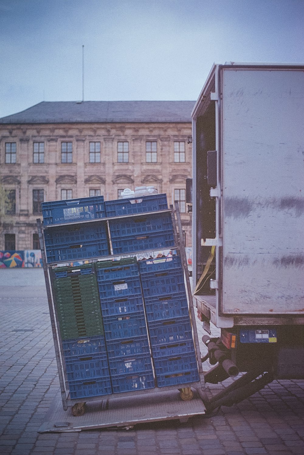 blue and brown wooden crates