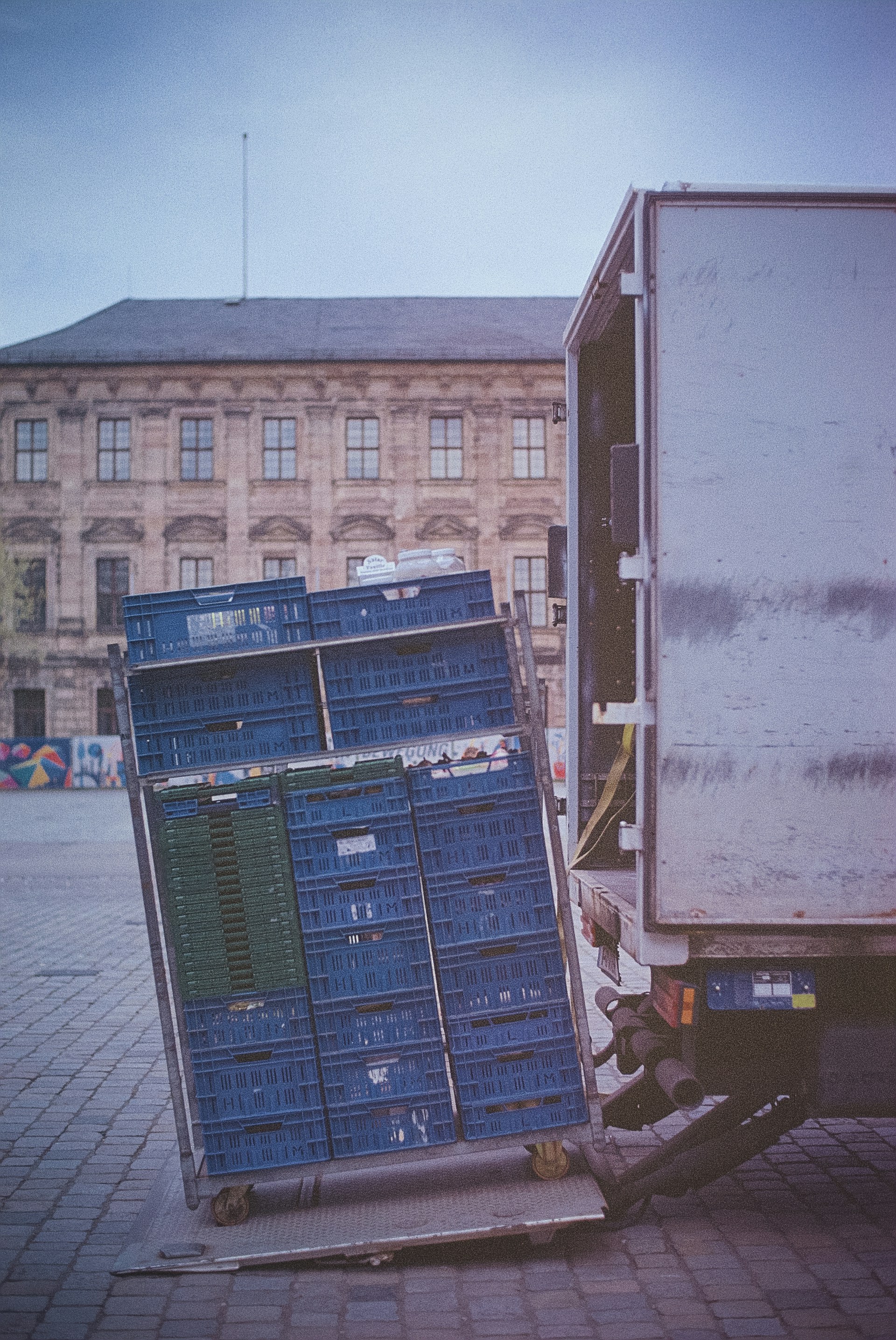 blue and brown wooden crates