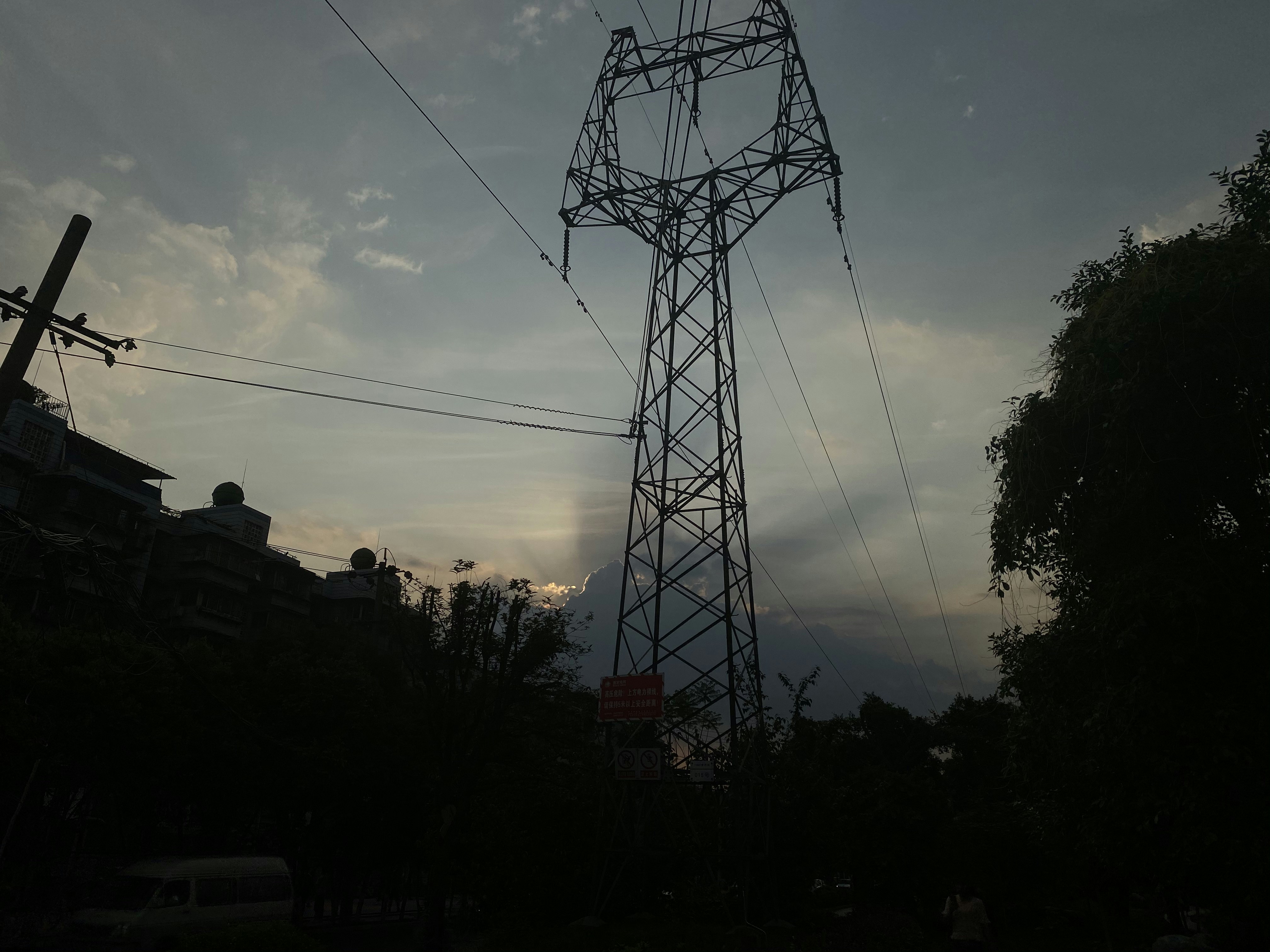Silhouette Of Electric Tower During Sunset