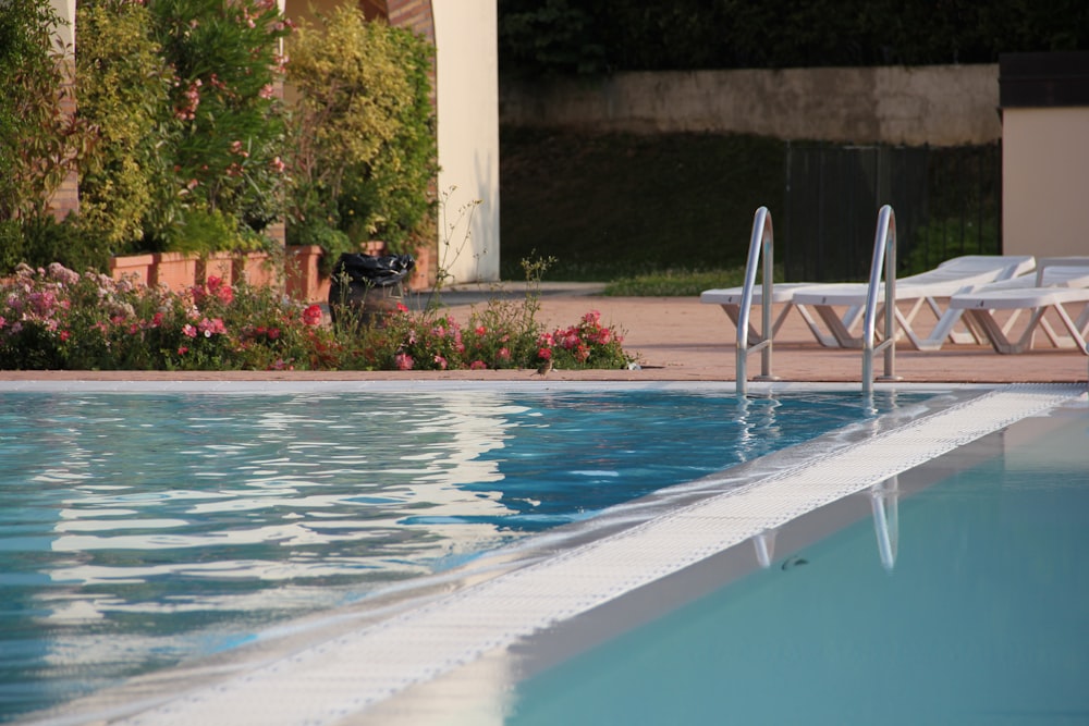 white and blue swimming pool