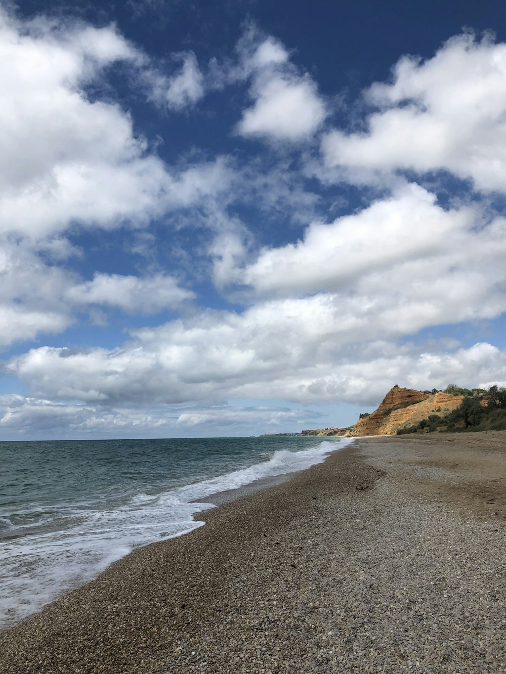 blue sky and white clouds over the sea