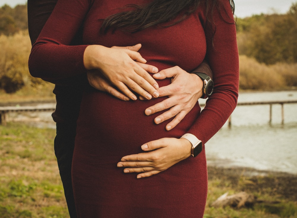 woman in red long sleeve dress