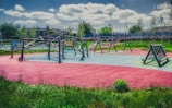 A group of children playing in a colorful playground.