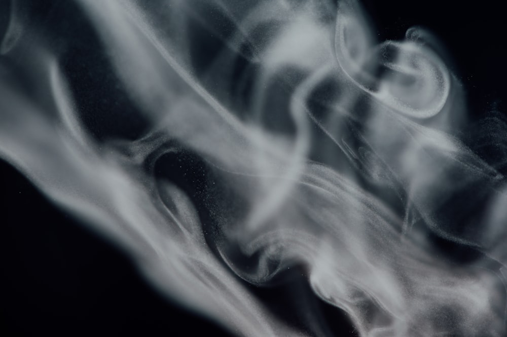 white smoke in black background