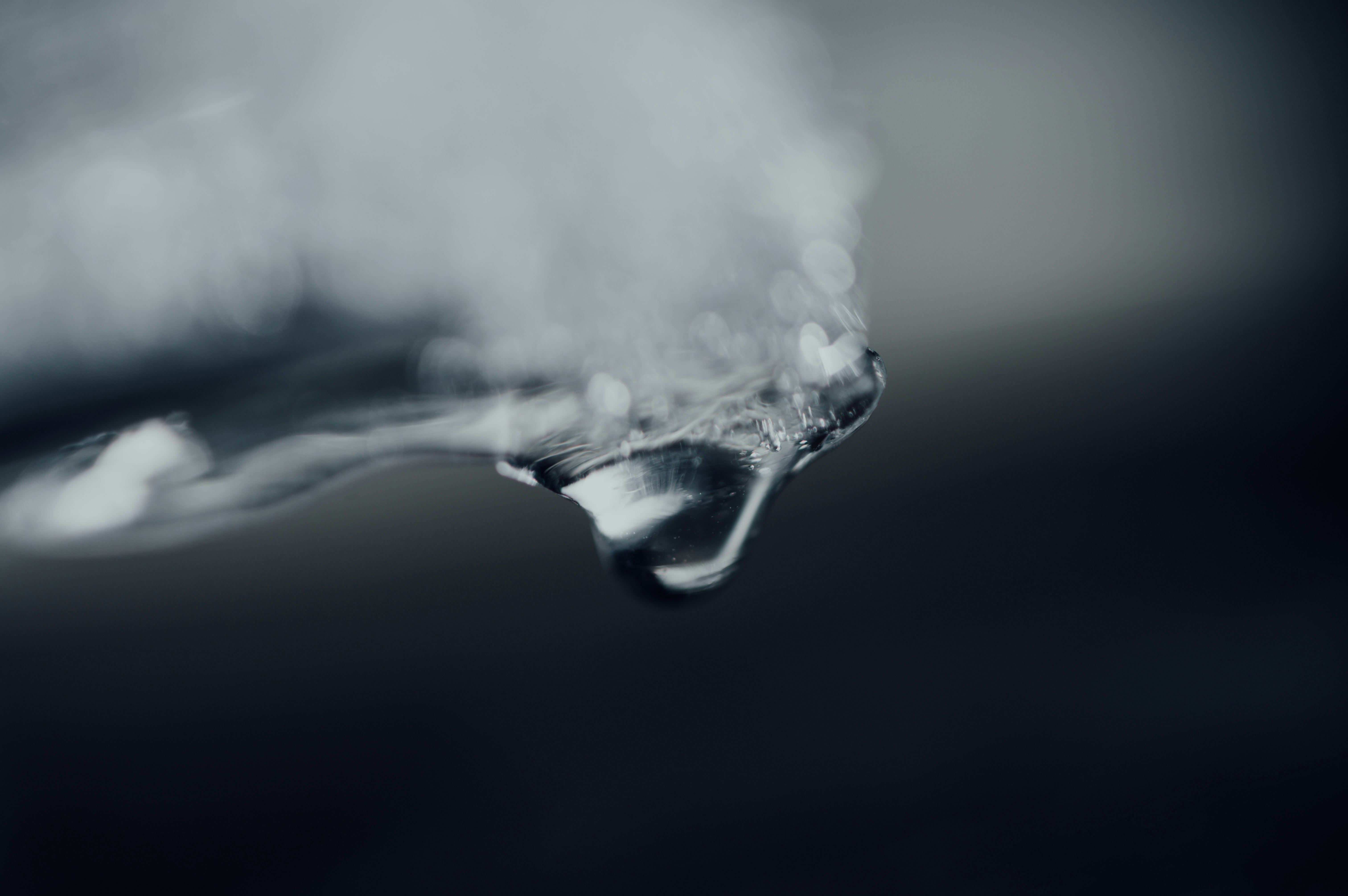 water splash in grayscale photography