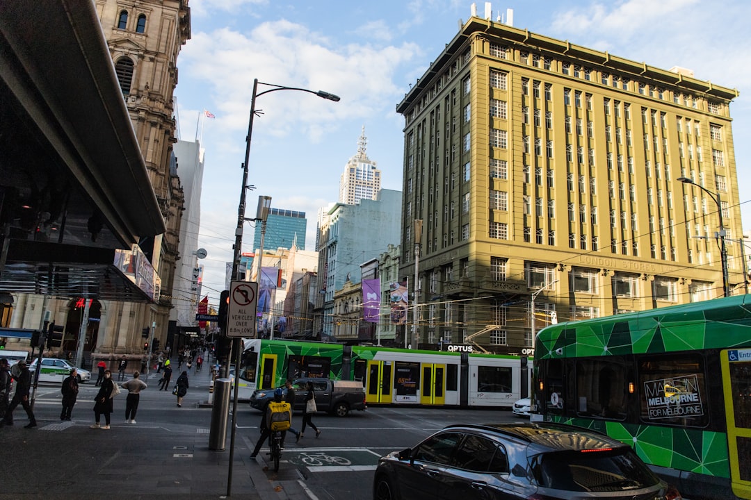 cars on road near buildings during daytime