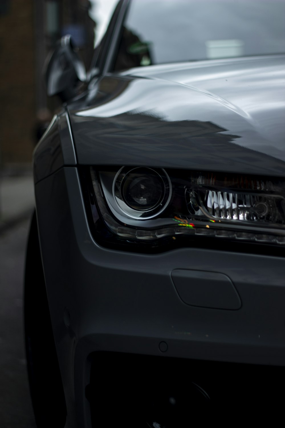 silver car with open hood