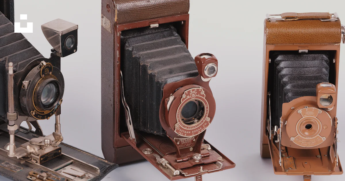 Camera Color Brown Brown and black camera on white surface photo – Free Camera Image on ...