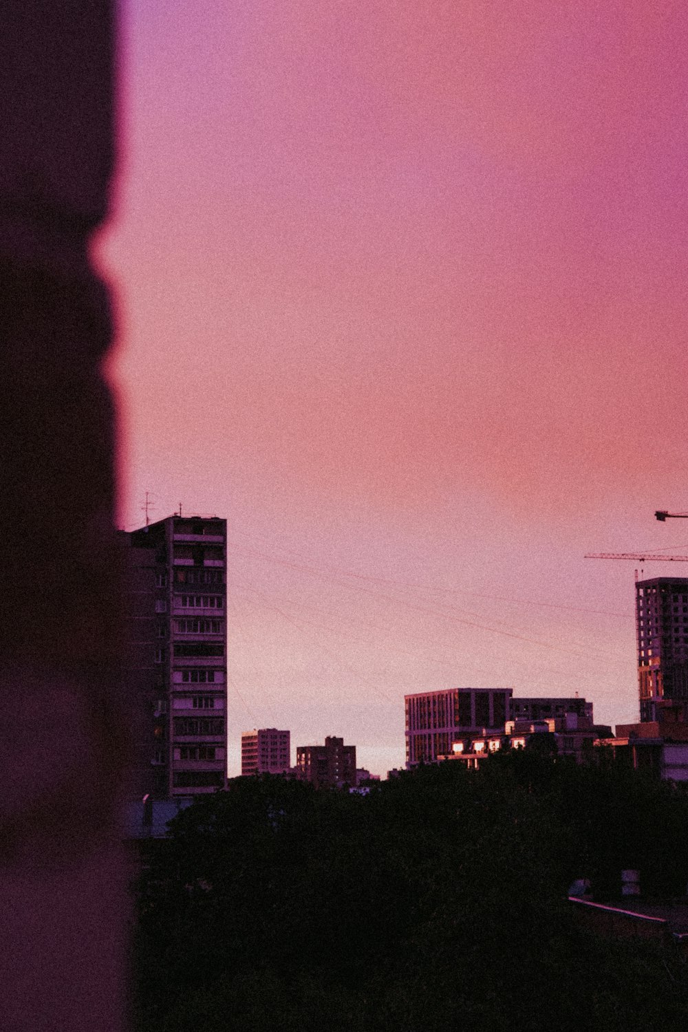 silhouette of building during sunset