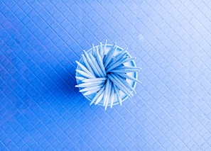 Top-down view of the pacific blue A3 cutting mat with precision grid lines and subtle grid texture