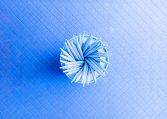 Top-down view of the pacific blue A3 cutting mat with precision grid lines visible