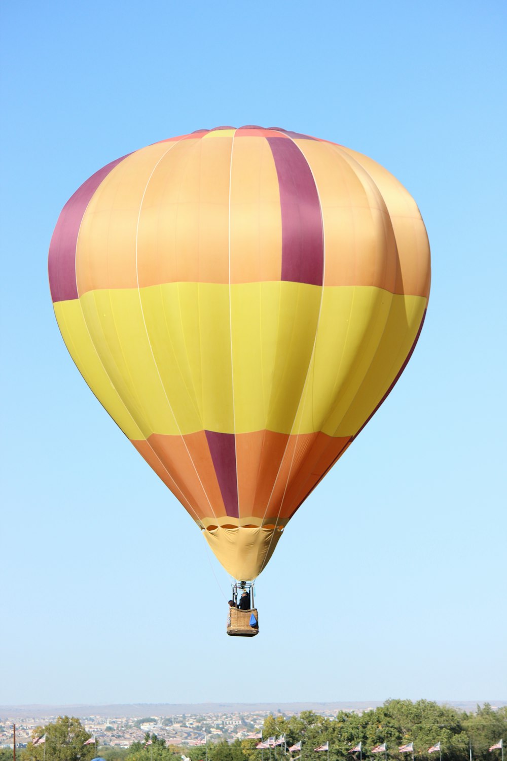 yellow blue and pink hot air balloon