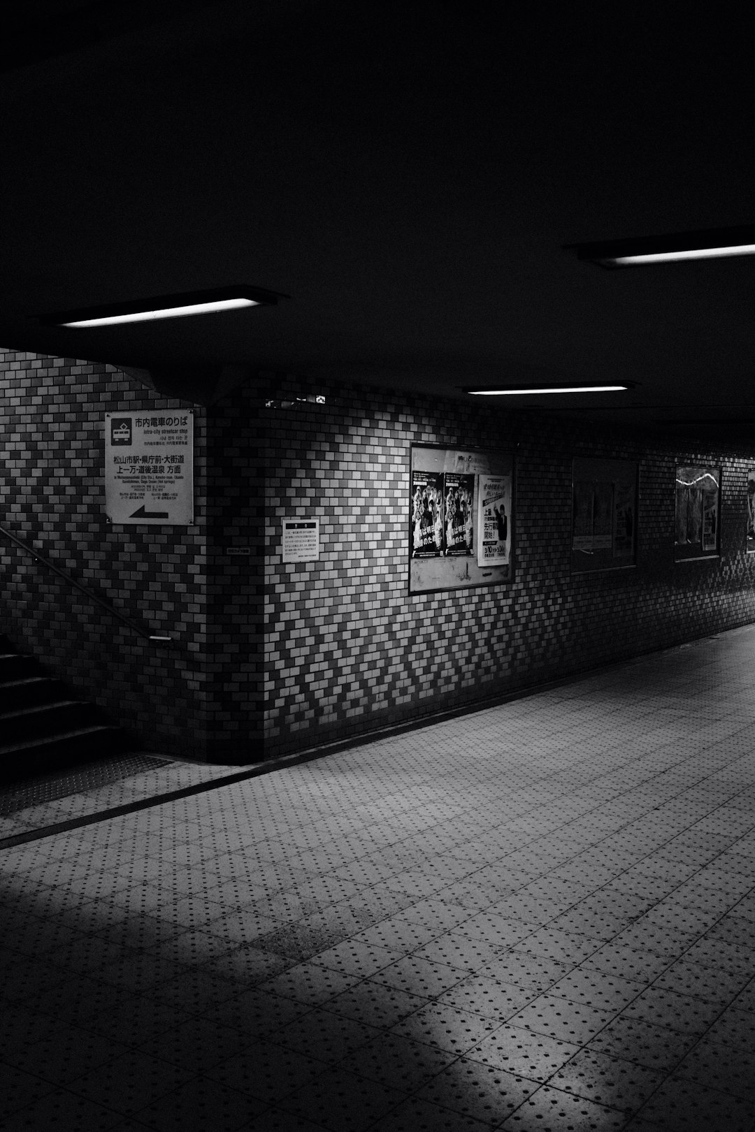 grayscale photo of a hallway