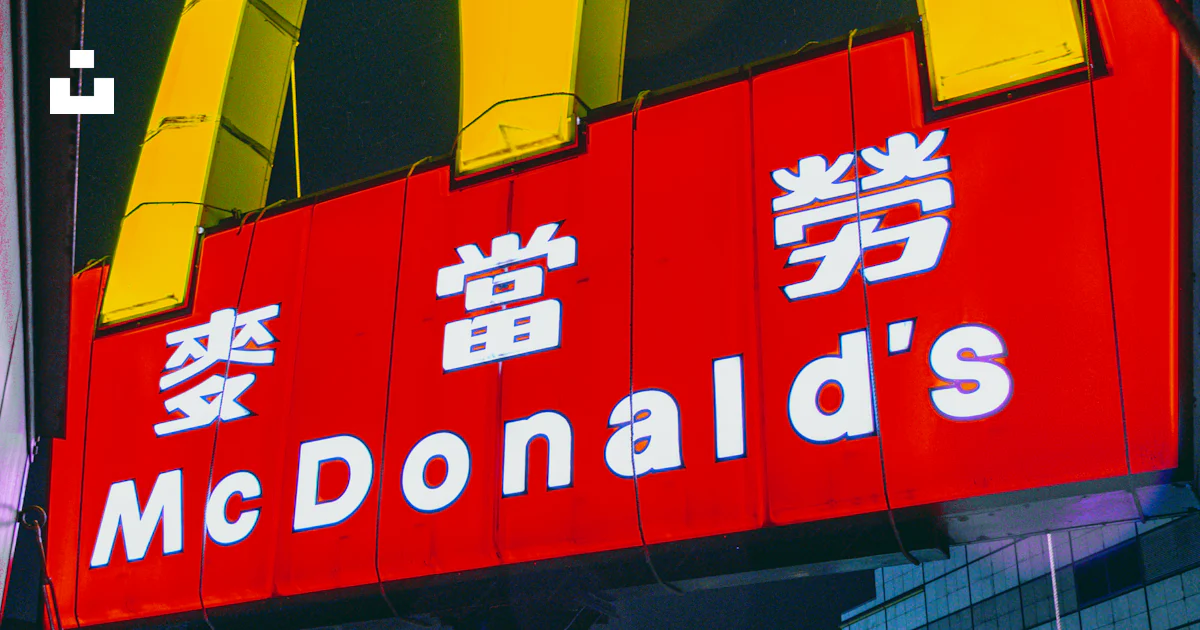 A neon mcdonald's sign is lit up at night photo – Free Word Image on ...