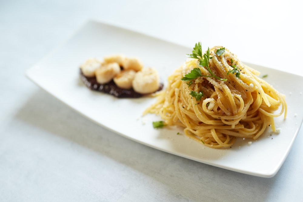 pasta dish on white ceramic plate