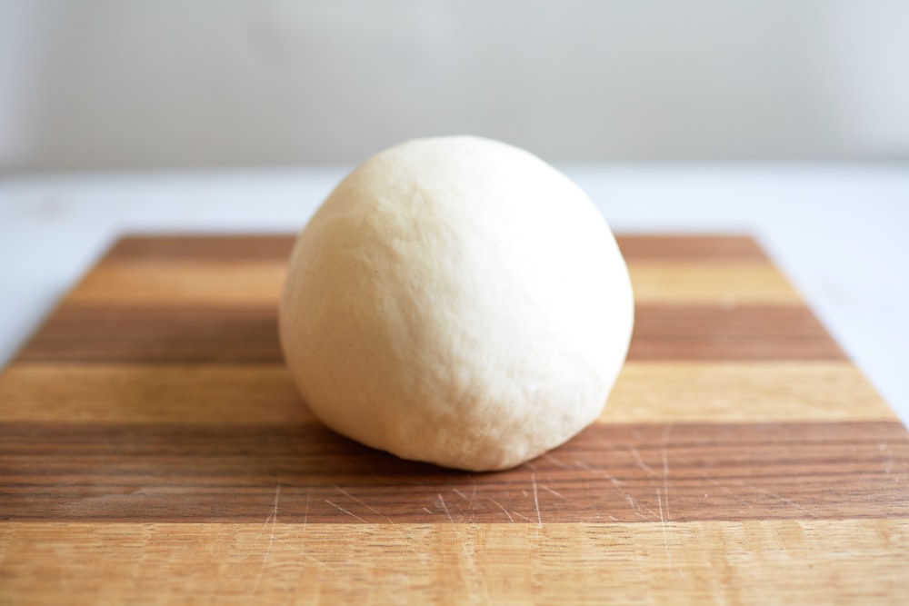 white round stone on brown wooden table