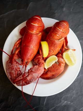 red lobster on white ceramic plate