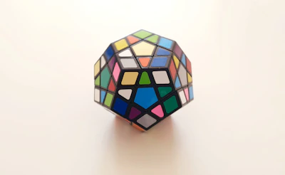 Close-up of a detailed 3D printed puzzle toy in bright colors.