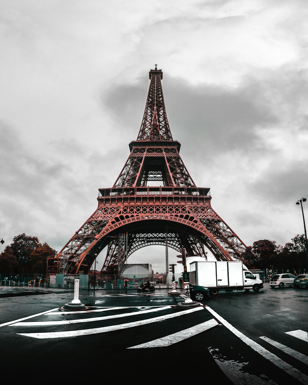 eiffel tower under gray cloudy sky