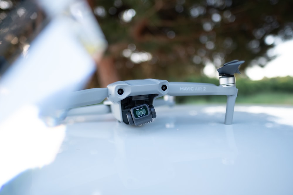 white and black drone in close up photography