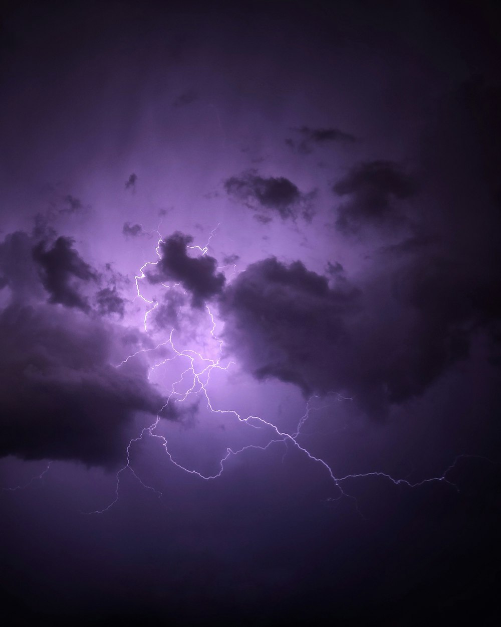 Striking Purple background lightning Photos, Footage, and Updates