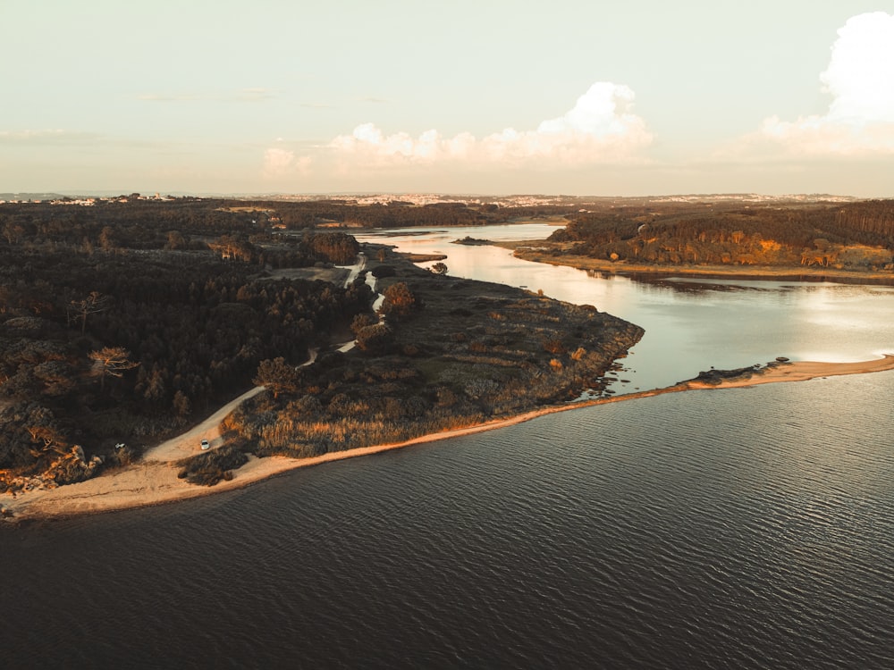 aerial view of lake and mountains during daytime