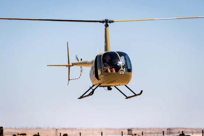 Robinson R44 helicopter hovering