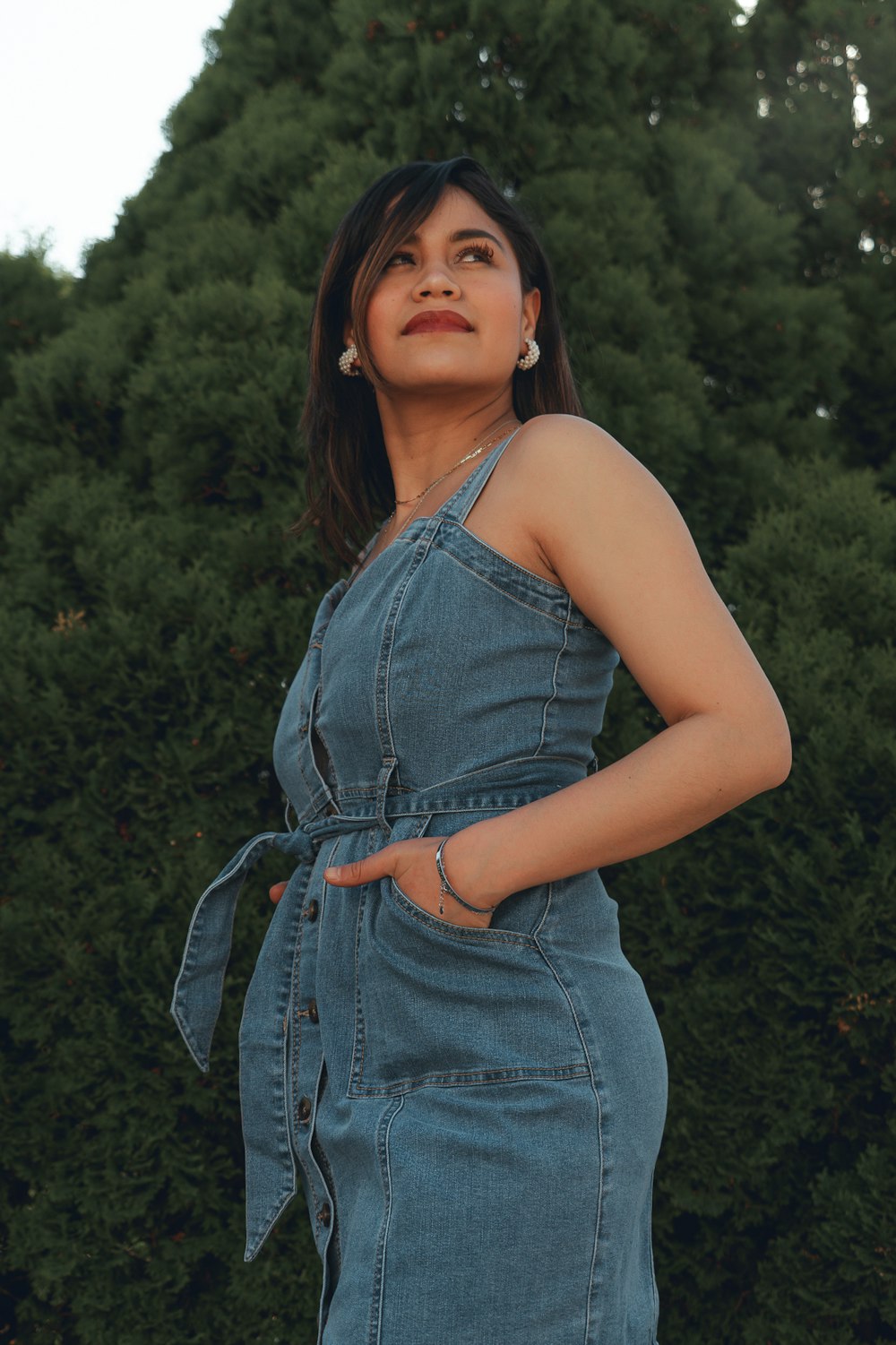 woman in blue denim dungaree