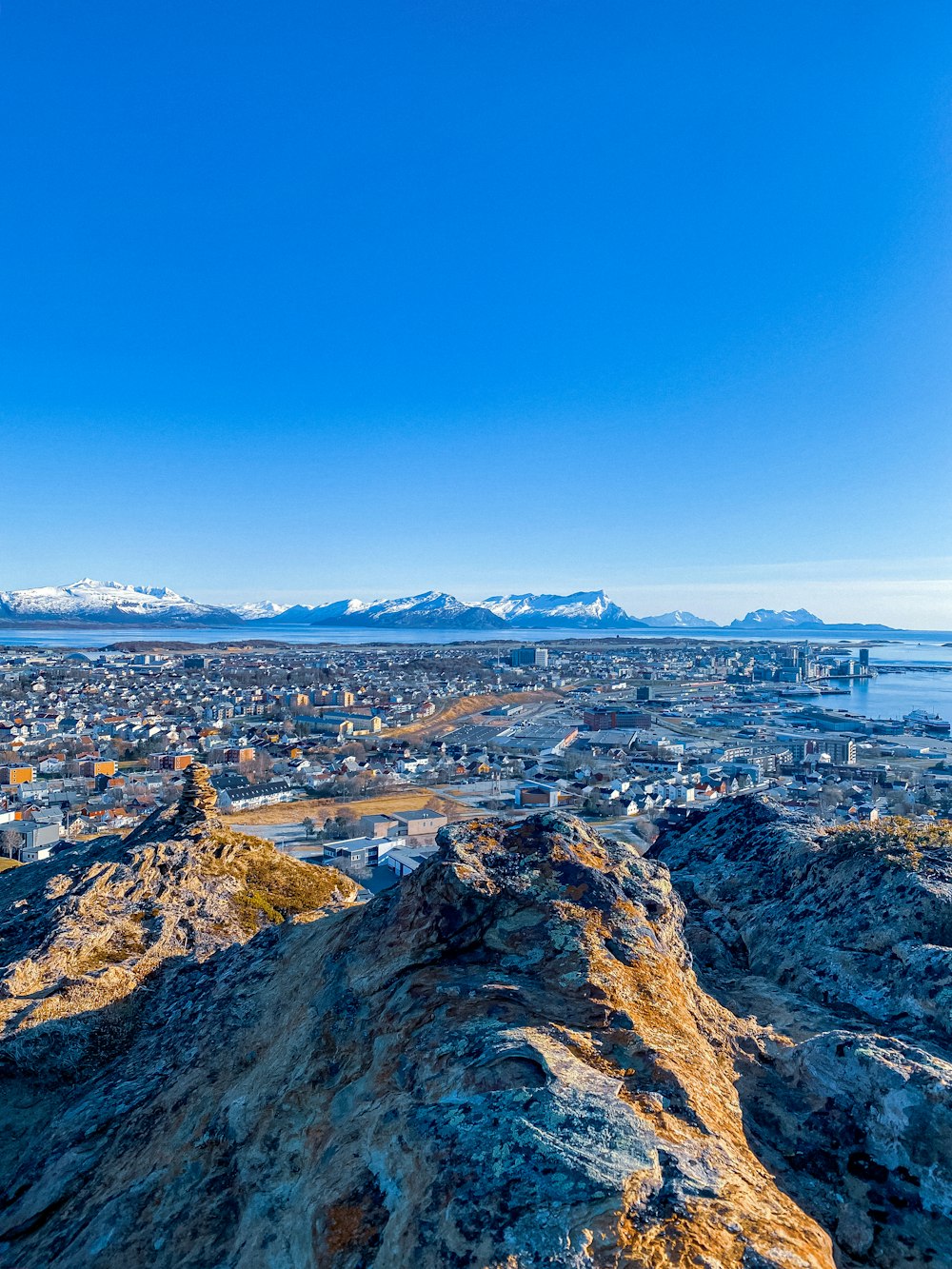 city skyline under blue sky during daytime