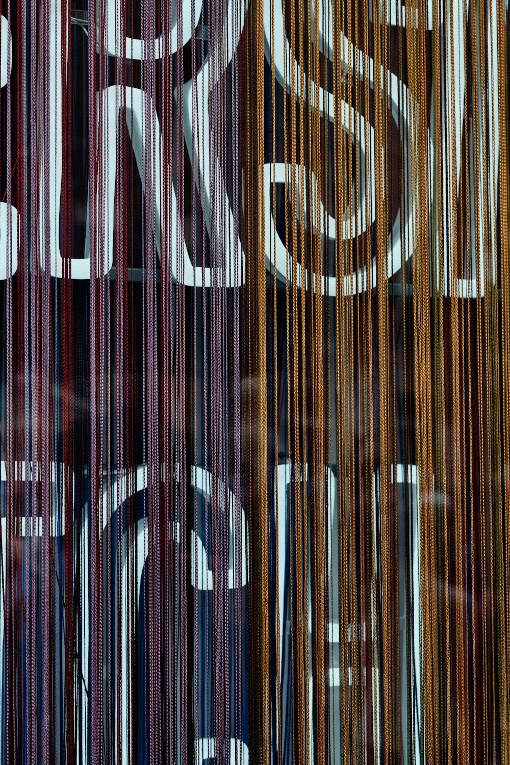 brown and black striped textile