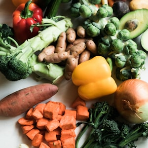 sliced carrots and green vegetable