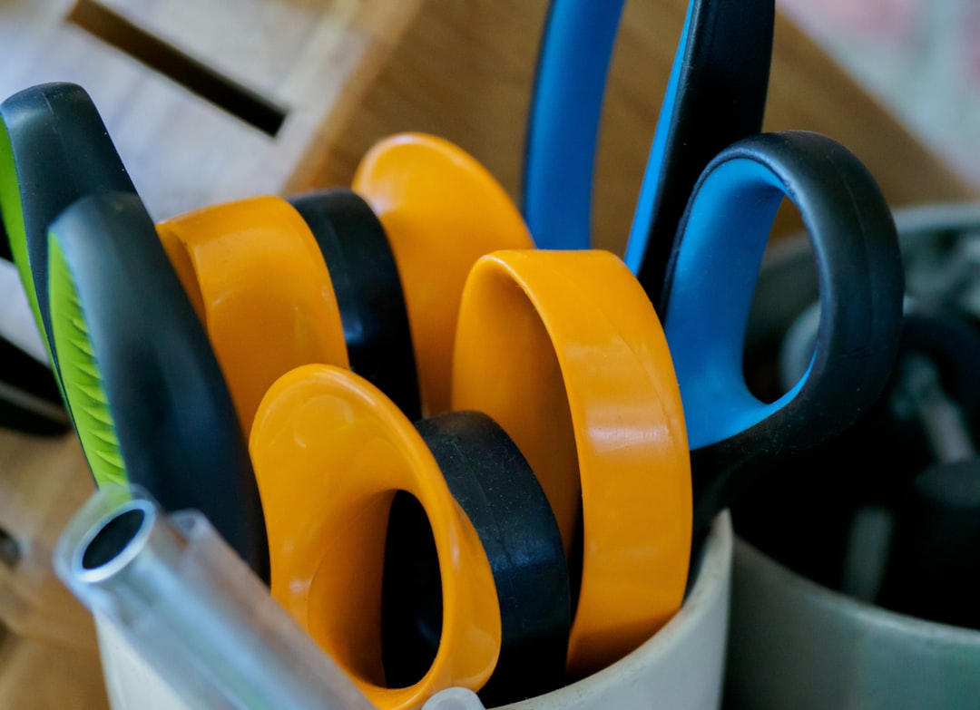 yellow blue and black plastic cups