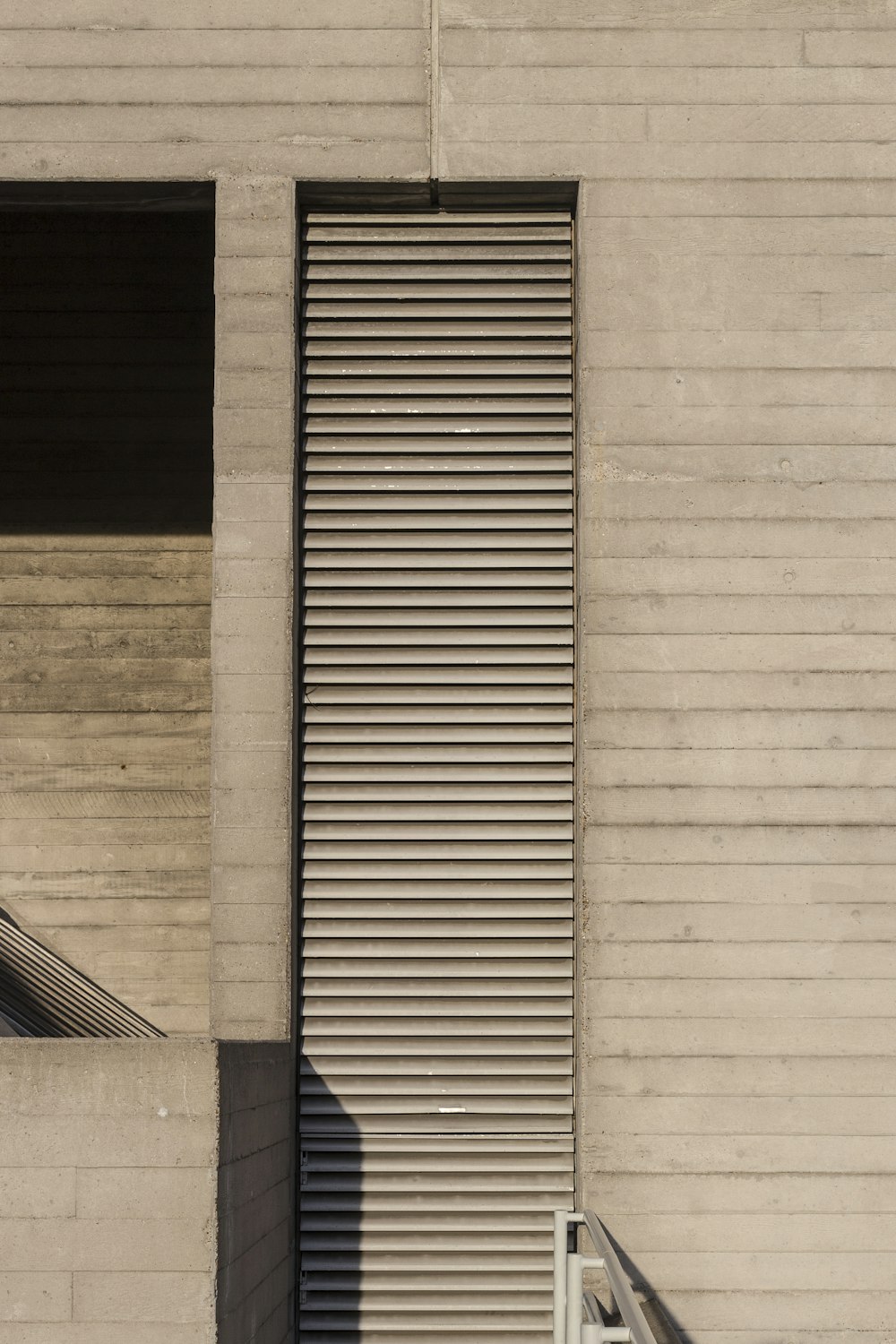 grayscale photo of concrete building