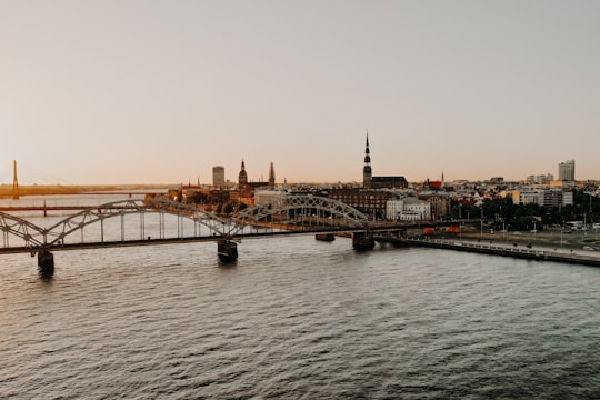 bridge over water during daytime in Riga Latvia