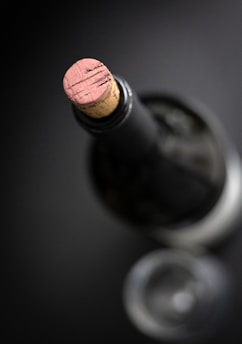 black glass bottle on table