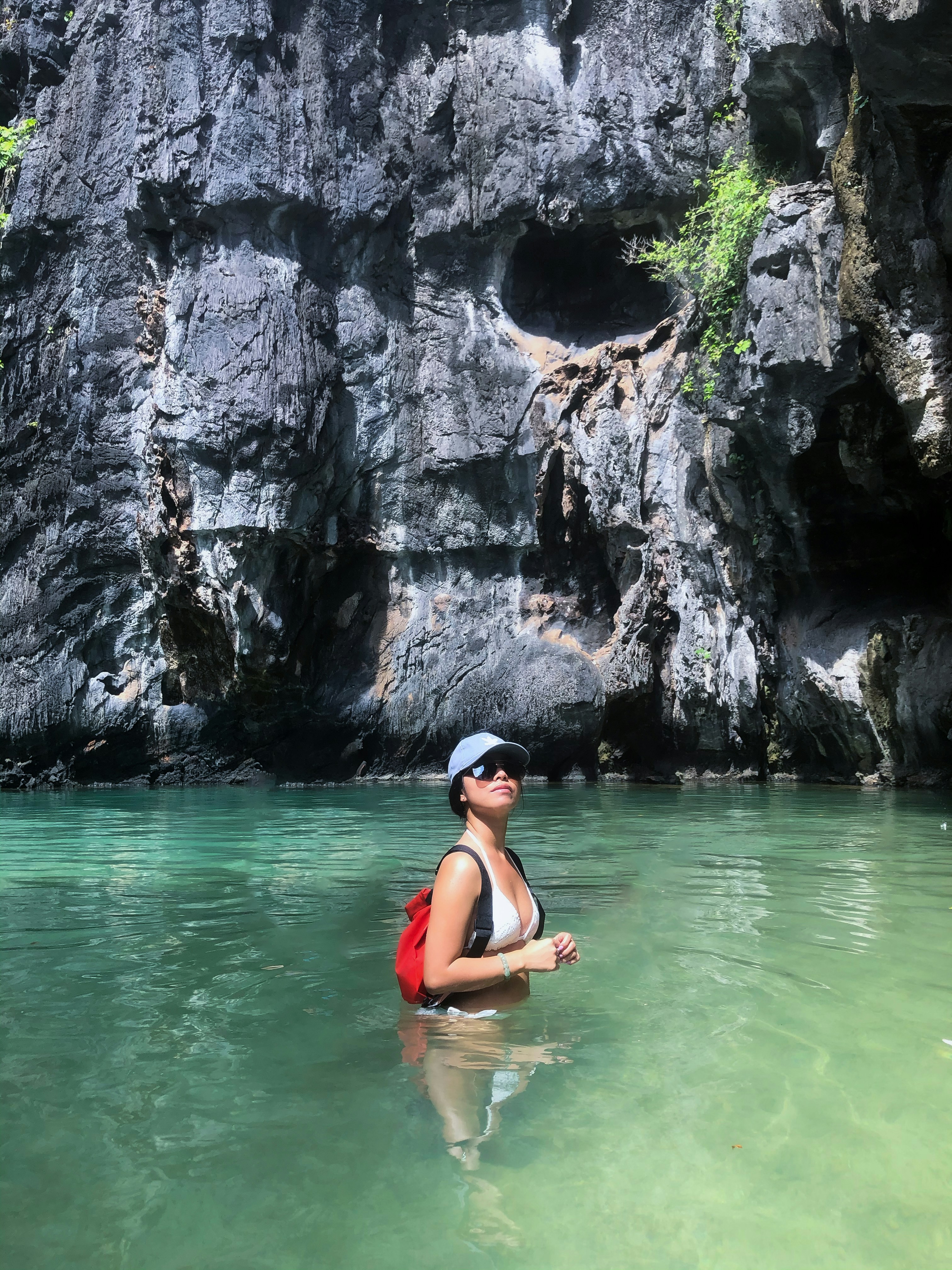 Woman in black bikini on body of water during daytime photo – Free ...