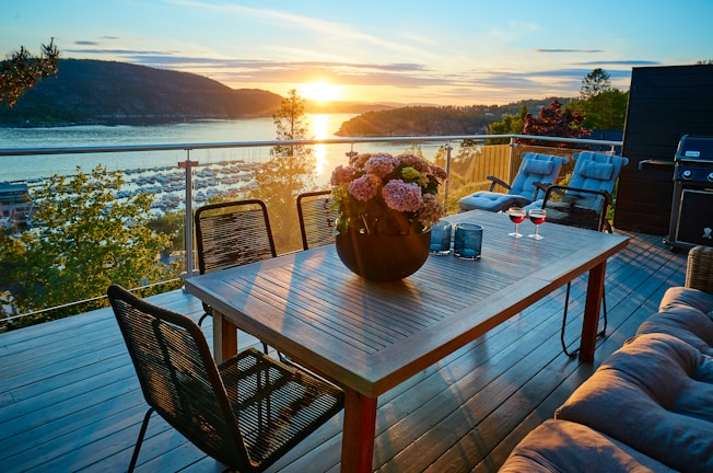 brown wooden table with chairs