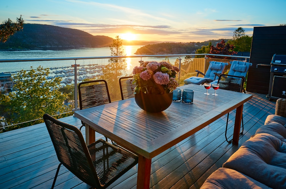 brown wooden table with chairs