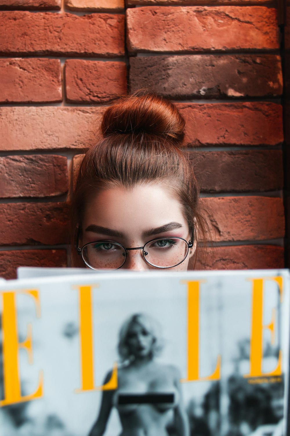 girl wearing black framed eyeglasses