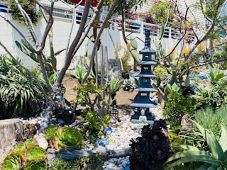 A serene home garden with auspicious plants.