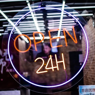 white and black neon light signage