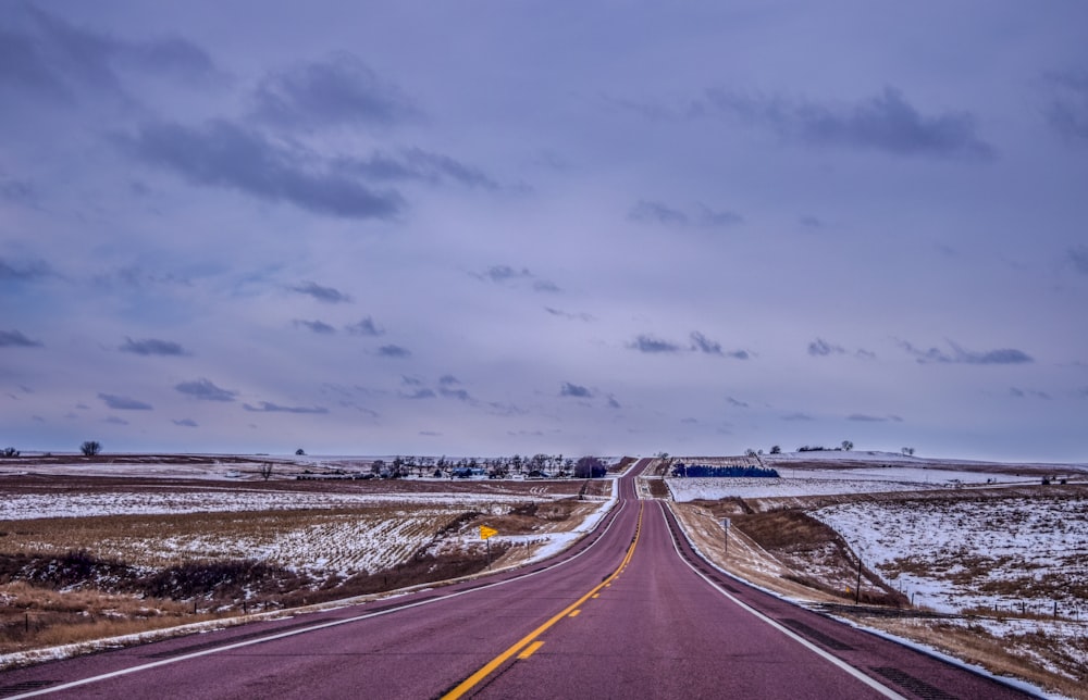 gray asphalt road under gray sky