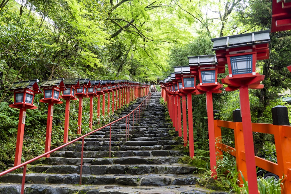 red wooden fence on gray concrete stairs