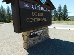 A city hall office with digital data screens showing municipal statistics