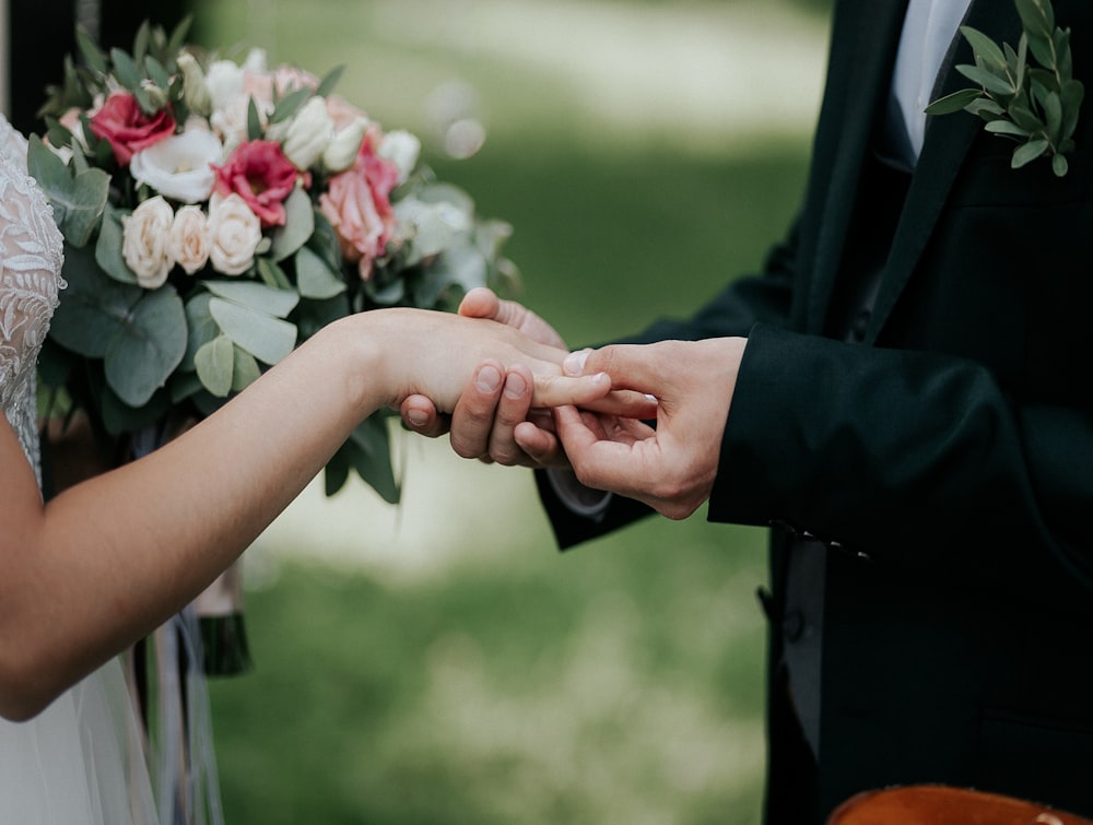 man and woman holding hands