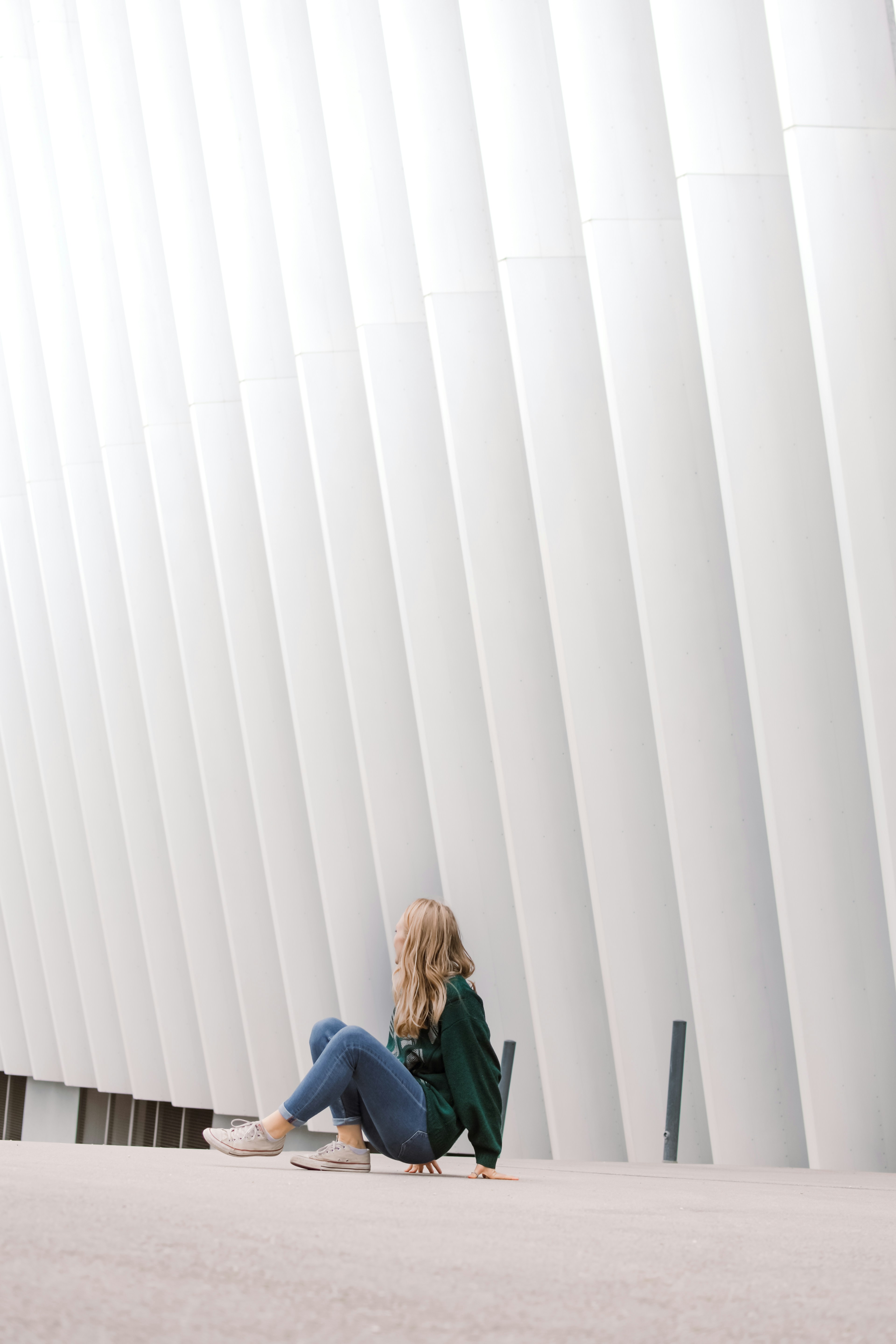 great photo recipe,how to photograph - lay back -; woman in black jacket sitting on blue chair