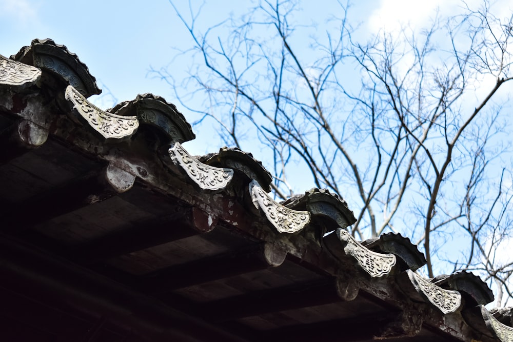 brown wooden roof under blue sky during daytime