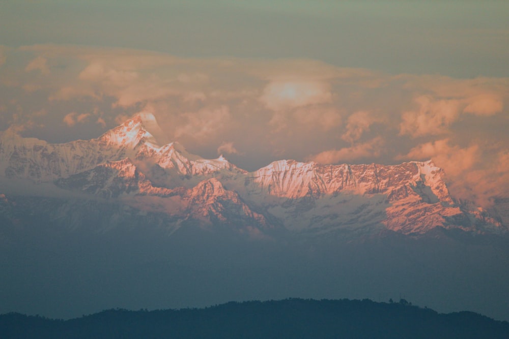 snow covered mountain during daytime