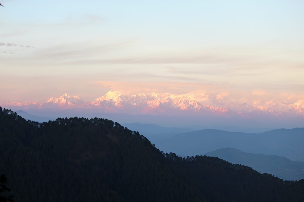 silhouette of mountains during sunset