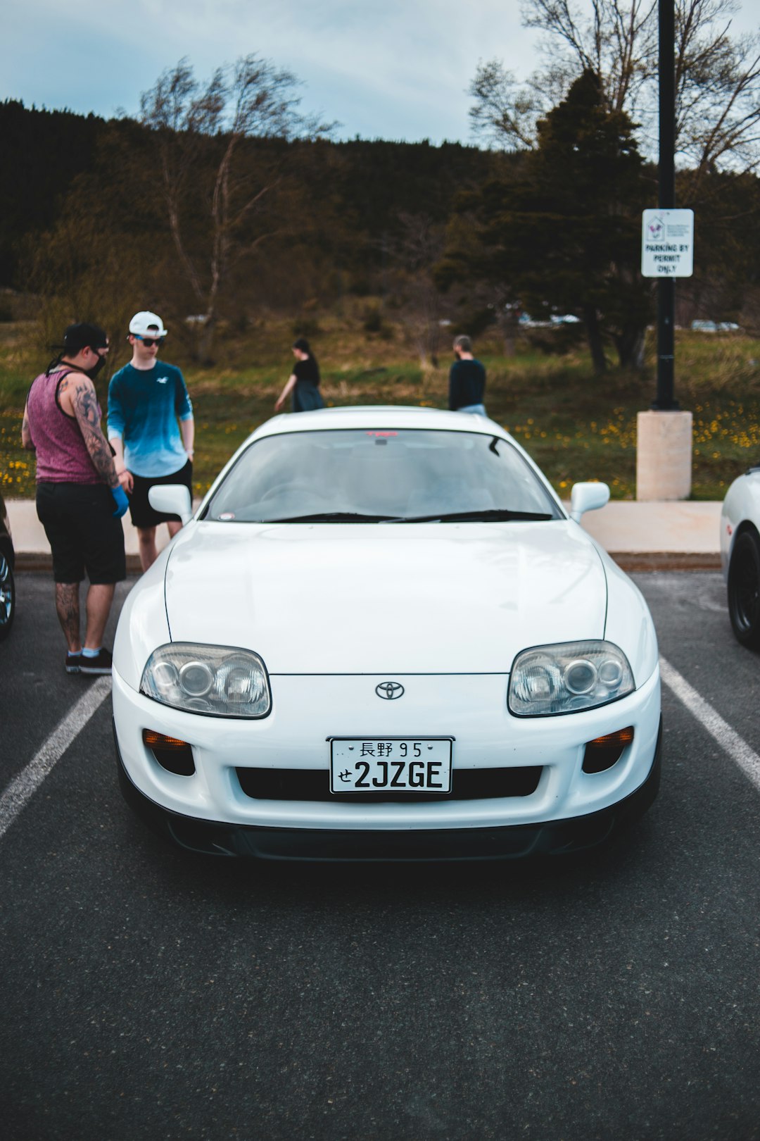 white bmw m 3 on road during daytime